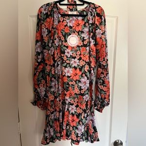 New with tags. MIDI length dress. With peachy color flowers
